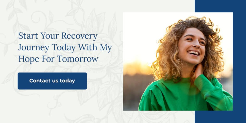 woman smiling as she is beginning addiction recovery